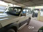 Mahindra scorpio white & black colored well maintained car