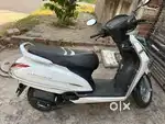 Brand new condition white colour activa with ome free service