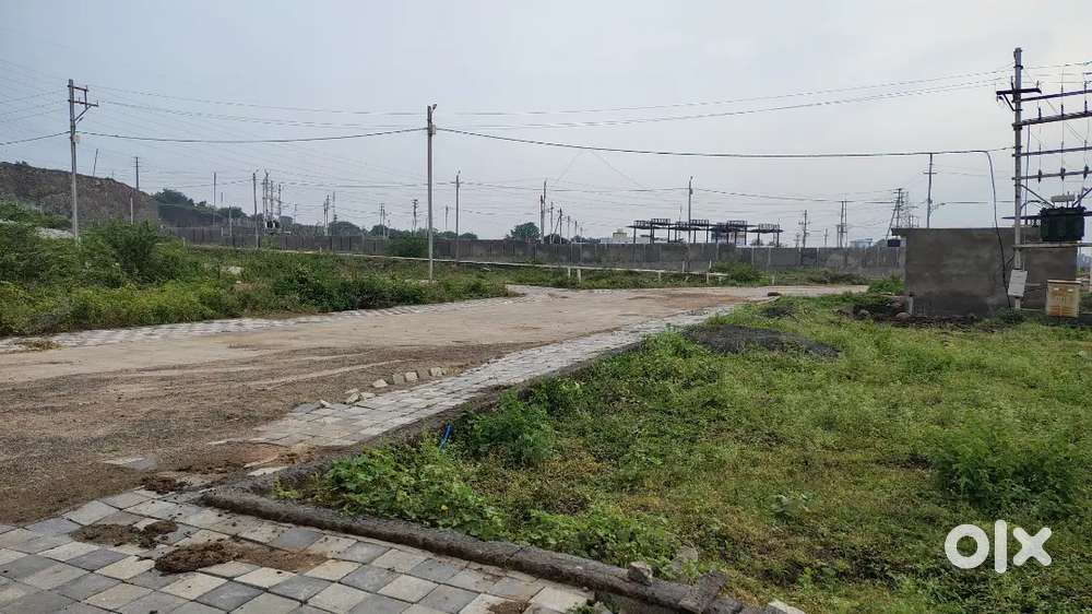 Indore ujjain Road touch near main gate Corner plot near main gate.