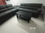 L shaped sofa and mahogany coffee table