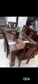 6 chair dining table available in Starf furniture