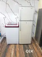 Samsung double door refrigerator and Whirlpool washing Machine*/*