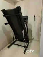 Folding motorized treadmill for home
