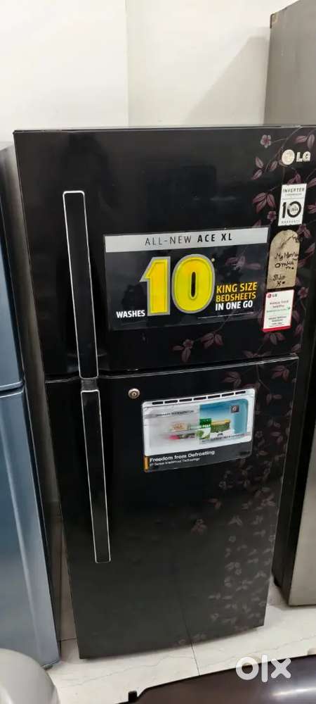 Samsung double door fridge good condition with warranty 1 year old