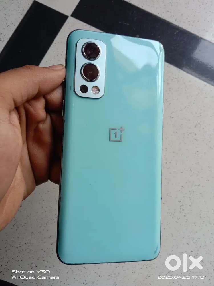OnePlus Nord2 5g 8 128 with bill charger glass finishing back