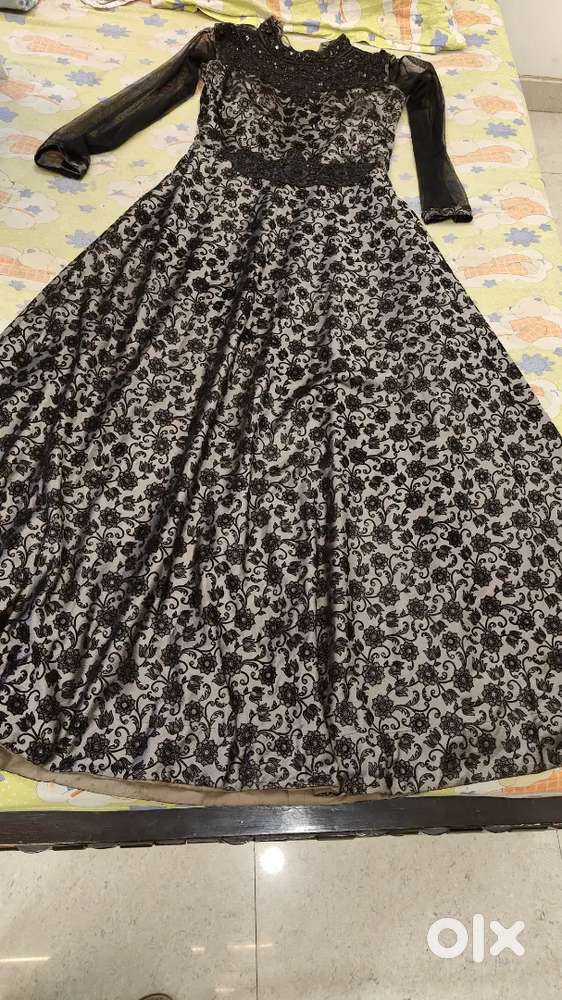 Party wear black gown with rich and elegant design
