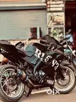 Modified r15v3 with silver colour alloy and akrapovi. Exhaust