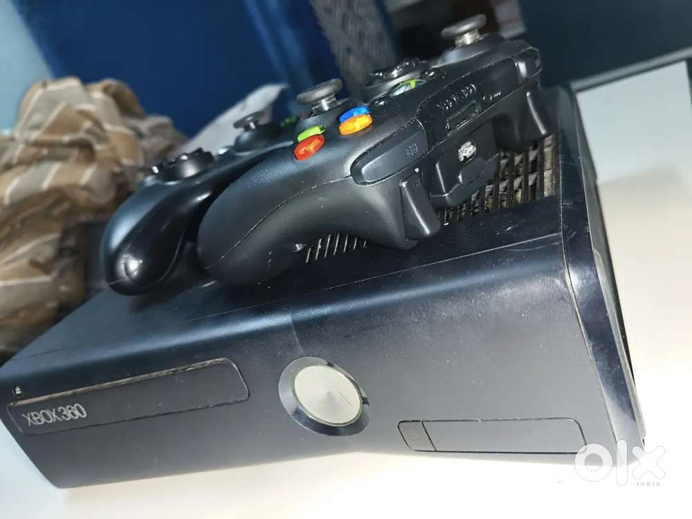 Xbox 360 with 500GB STORAGE AND 62 GAMES
