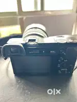 Sony A6000 + Sony FE1.8 50mm prime lens (full frame) + SD card