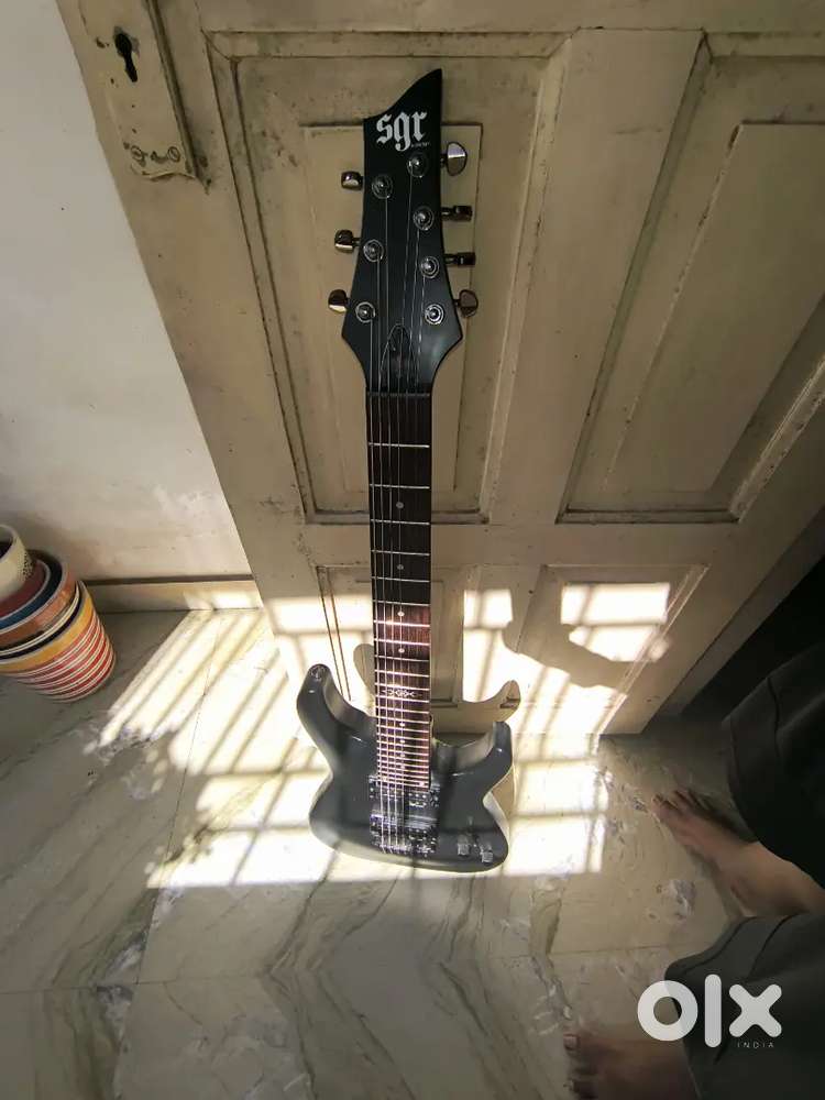 Sgr Schecter 7 string electric guitar (sgr diamond pickups)