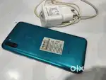 Samsung M11 mobile with Samsung charger.