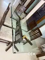 Glass top and teak wood frame dining table