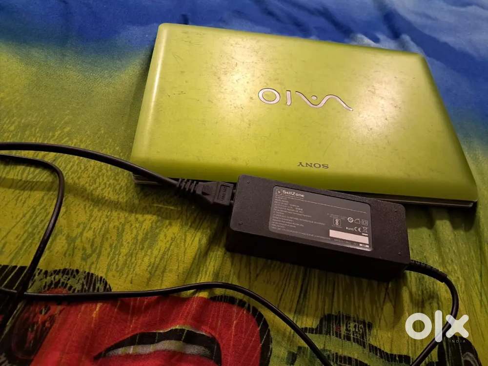 Sony Vaio Laptop with additional 2 GB RAM, plus laptop charger & cover