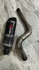 Raleigh Cycle and Exaust for bike with pipe.