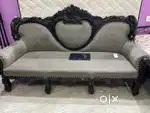 Brown wooden sofa