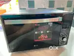 LG NEW ALL IN ONE CHARCOAL MICROWAVE FOR SALE