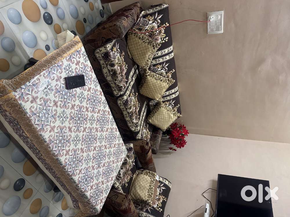 5 seater sofa set with heavy wooden table