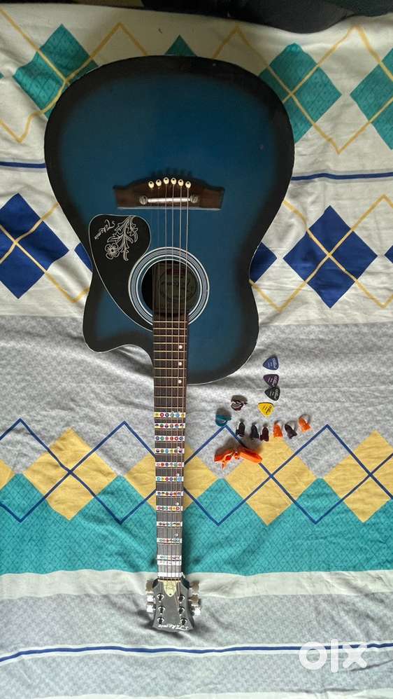 Guitar - mint condition, new strings & Tuner