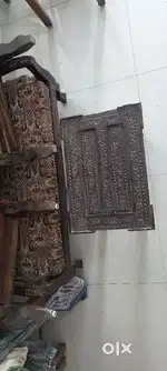 Antique sofa in carving