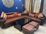 L shape 7 seater sofa set with 2 puffy and center table