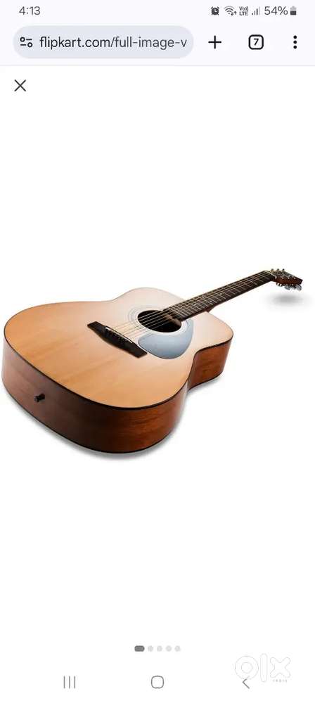 Yamaha f310  with premium mettalic capo and axtra strings.