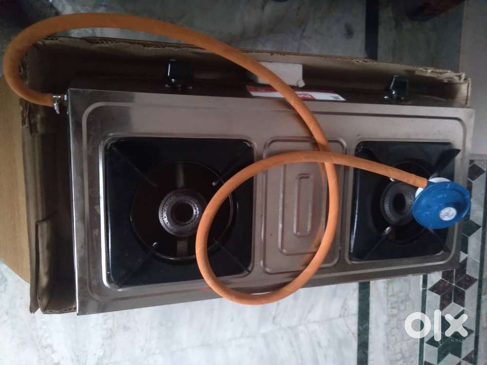 Gas stove, ceiling fan, smart TV and revolving chairfor sale