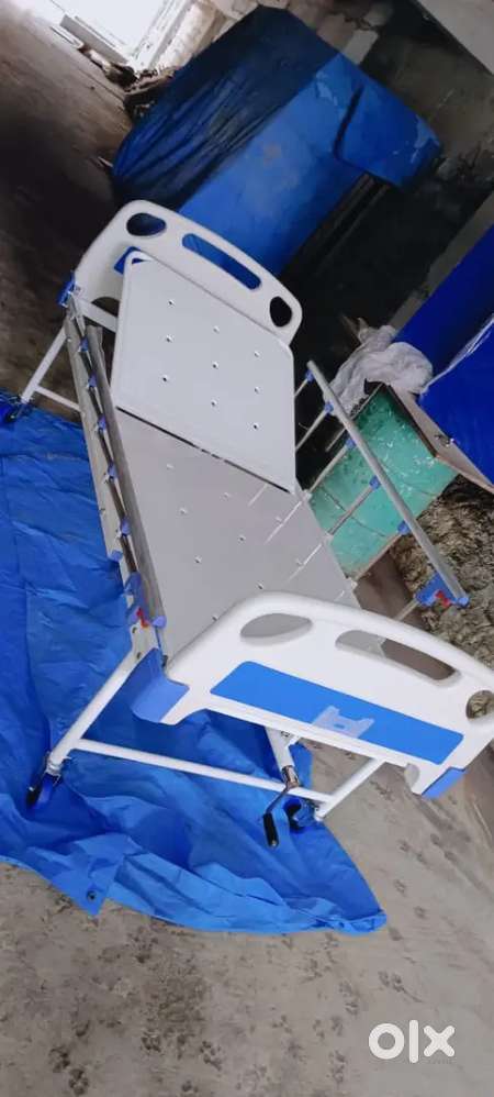 Medical bed with side folding support and recline