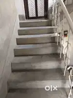 A nice looking room with a great view outside