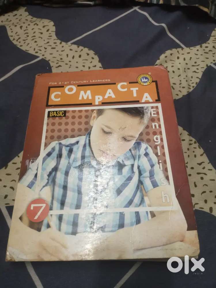 this is 7th class book english title book compacta the book is 2ndhand