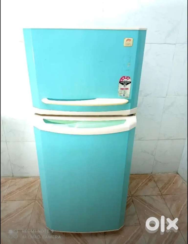 Id-90776. Godrej double door green colour fridge