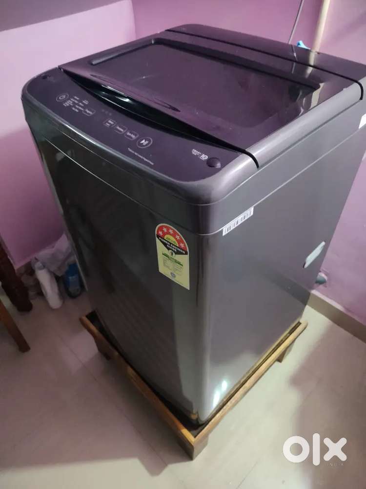 LG washing machine 7 kg fully automatic top load. Only 4 days used.