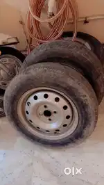 R14 Apollo tyre with original Swift Steel Rim