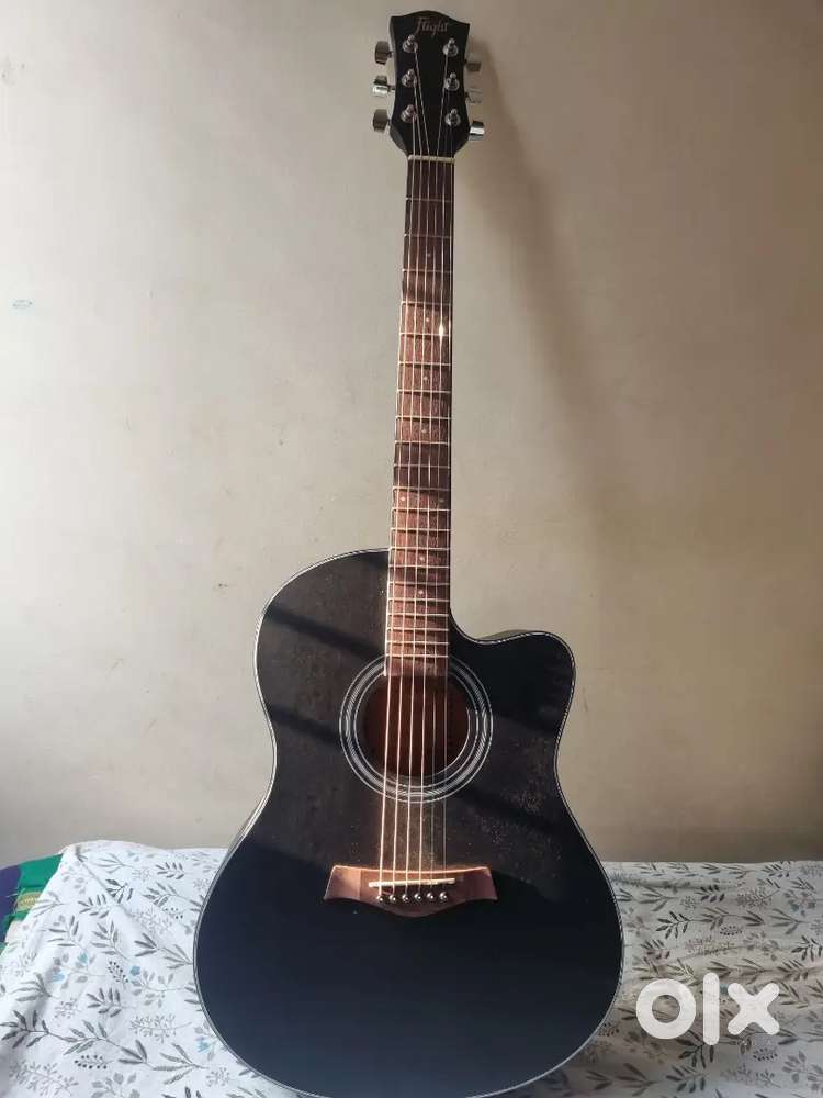 Flight guitar 1 year old