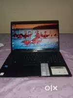 Asus laptop with laptop charger,hp mouse, keyboard dell, stand;