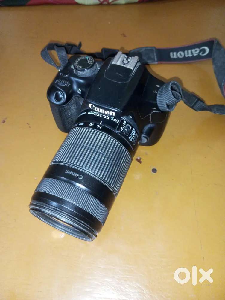 Canon DSLR 1300 55-250 lense and charger