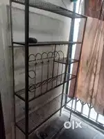 Iron shelf for utensils