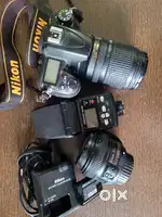 Nikon D7000 +  kit lens 18-140 + 50mm1.8+ nikon flash battery charger