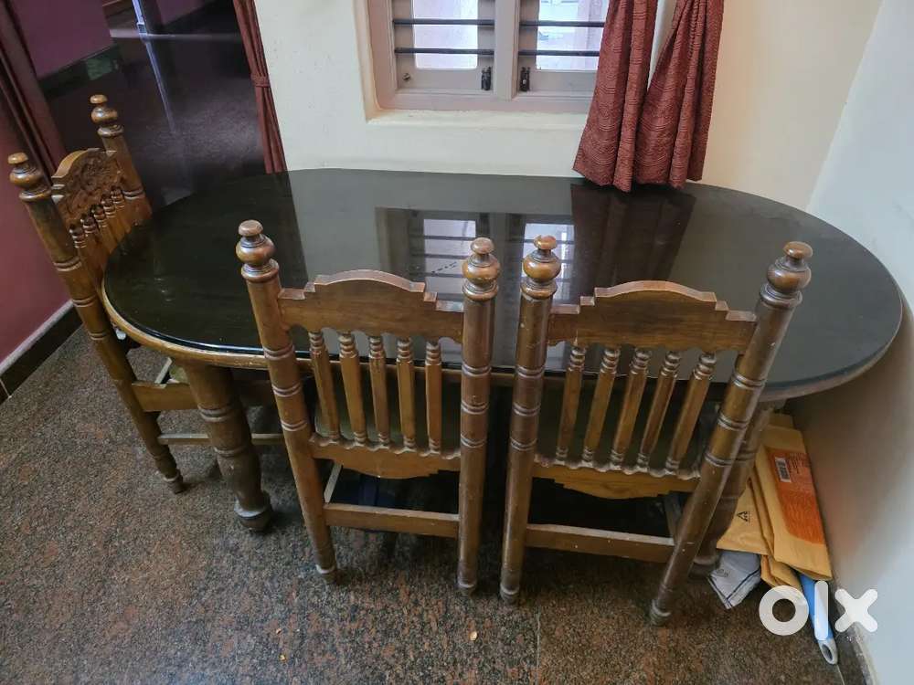 Wodden sturdy Dining table with 6 chairs for sale