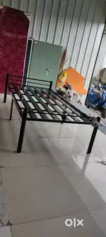 Single metal bed with metal frame and metal strip