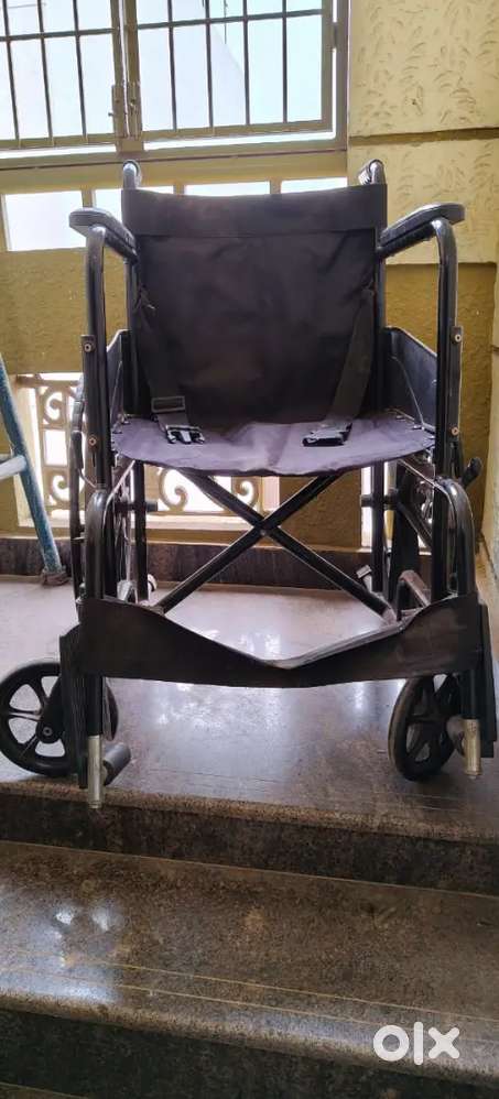 Wheel chair one year old Good condition brand new