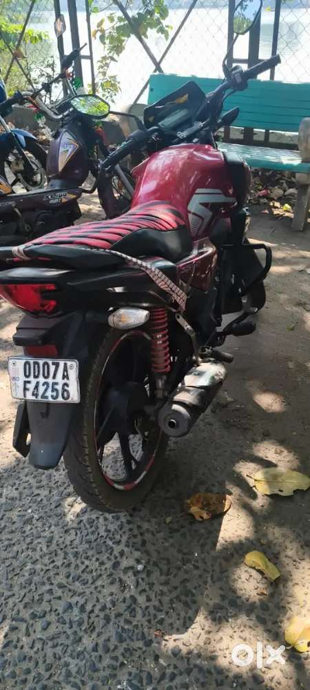 Red colour bike with perfect condition.