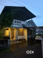 House with car porch, workarea and truss