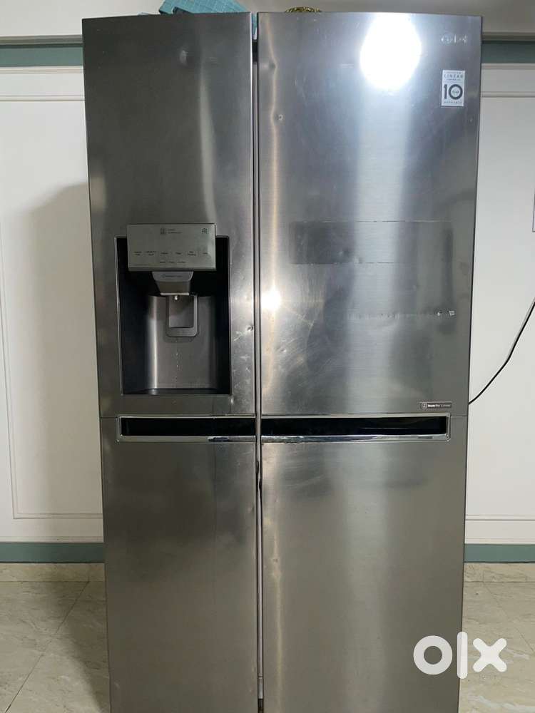 LG SIDE BY SIDE FRIDGE