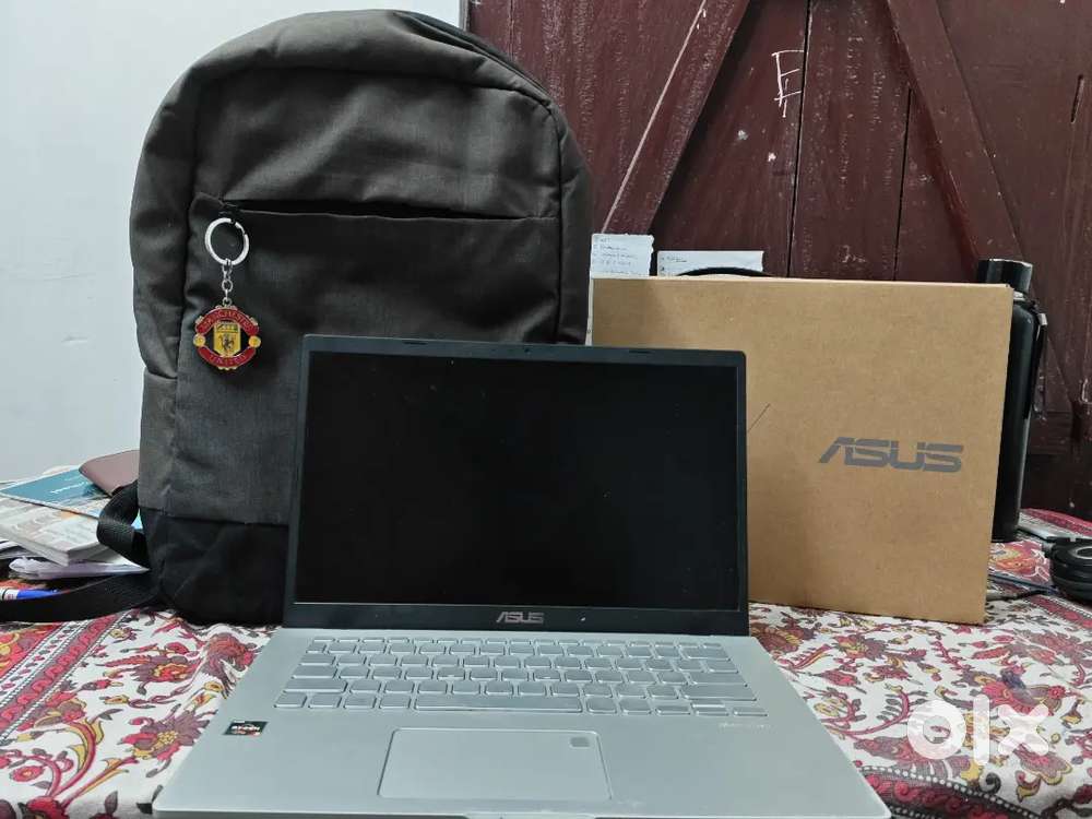 Asus 11th generation laptop with free bag and box(great condition)