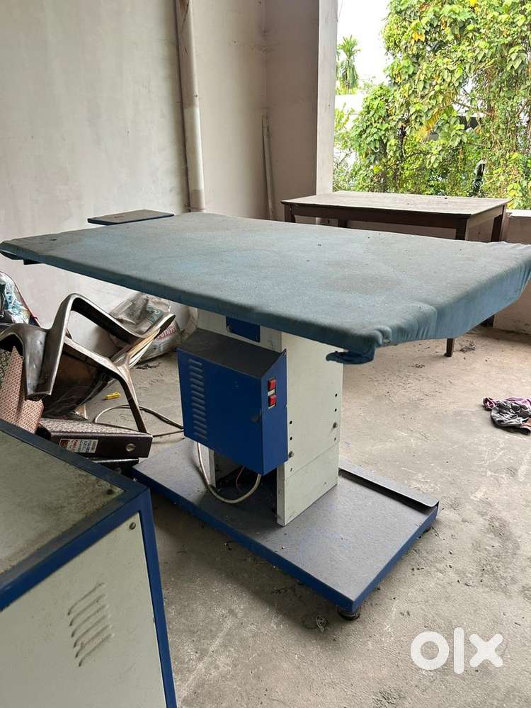 Ironing machine steam press