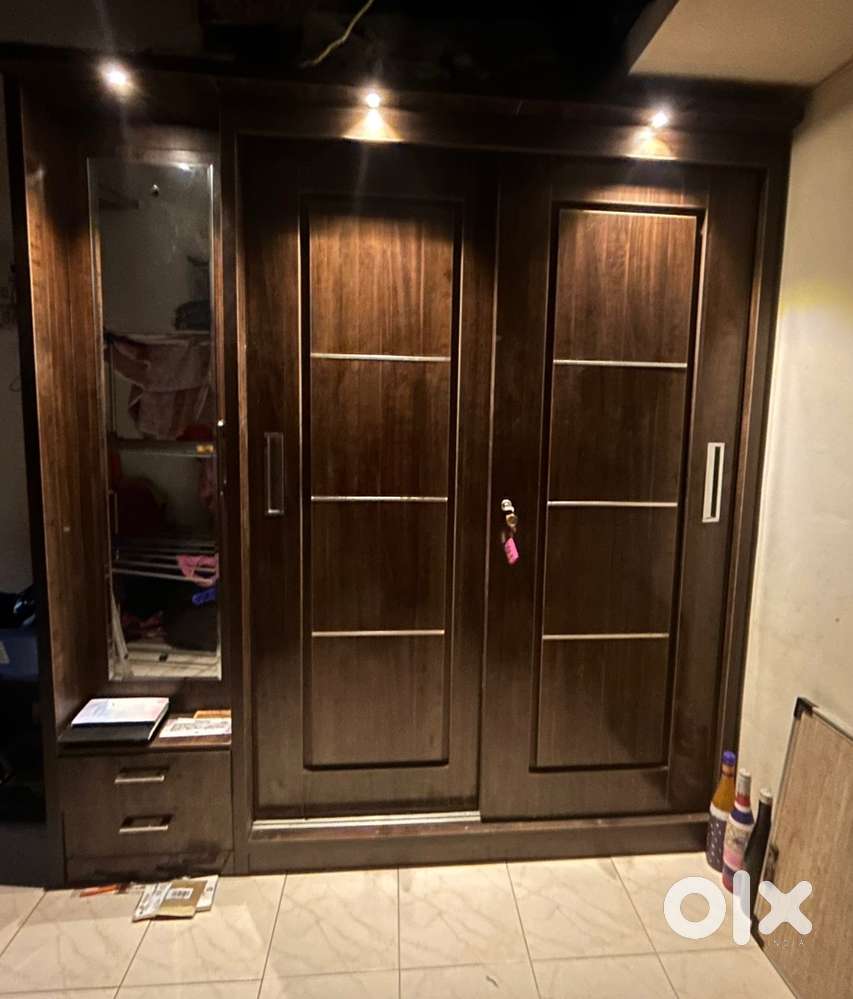 Elegant Woodan wardrobe with attached dressing table