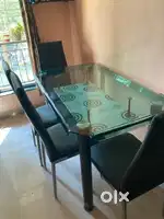 Glasss top dining table