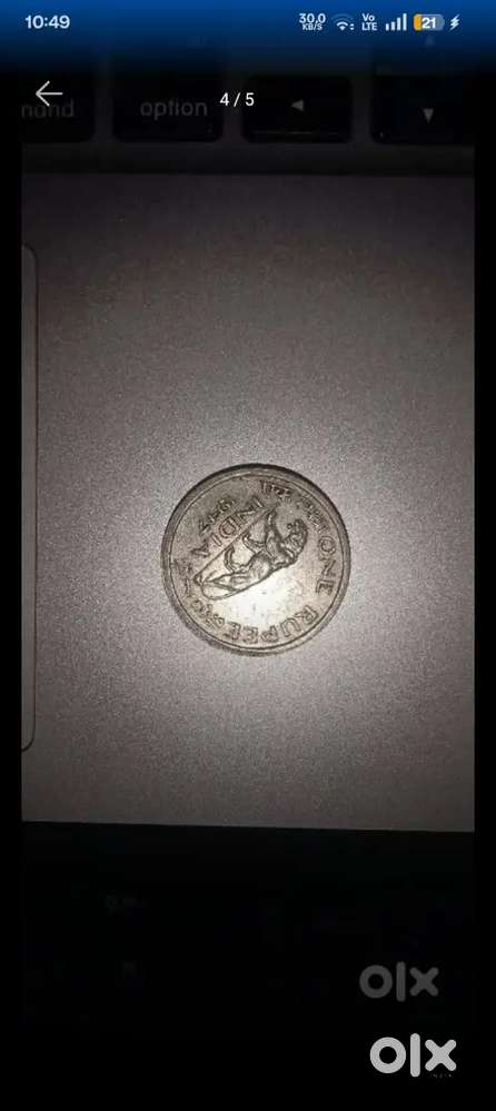 antique coin of one rupee indian coin 1947( indipendent day )
