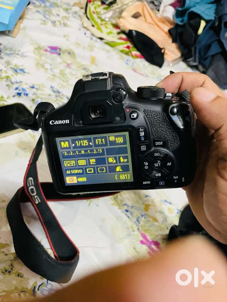Canon 1300d new condition 6 month old