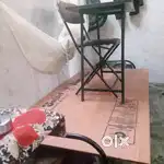Bed, table, chair, white board